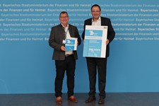 Staatssekretär Martin Schöffel übergibt Förderbescheid nach der Heimat-Digital-Regional-Förderrichtlinie an